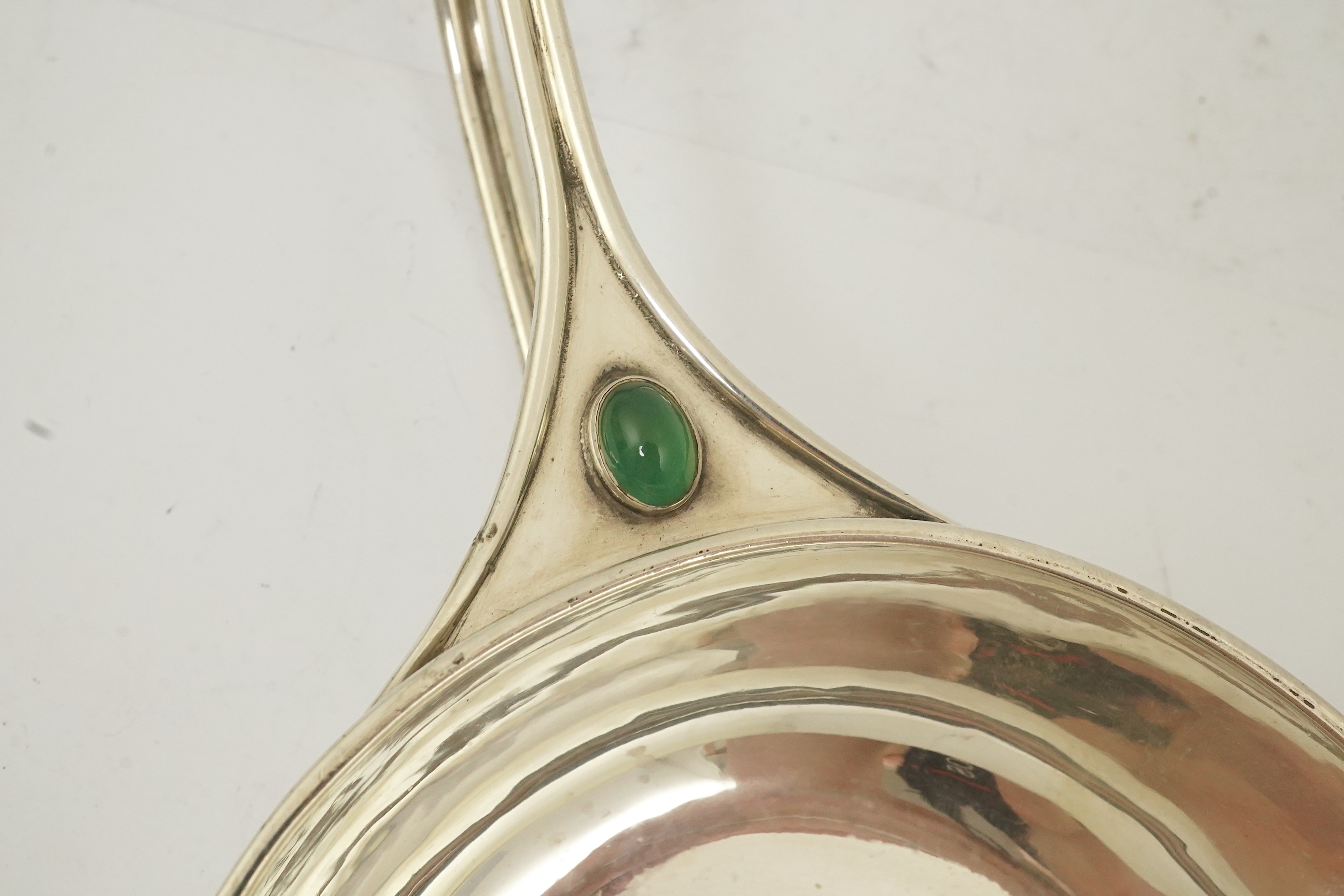 An Edwardian Arts & Crafts Charles Robert Ashbee for the Guild of Handicrafts Ltd silver and single stone cabochon chrysoprase set porringer